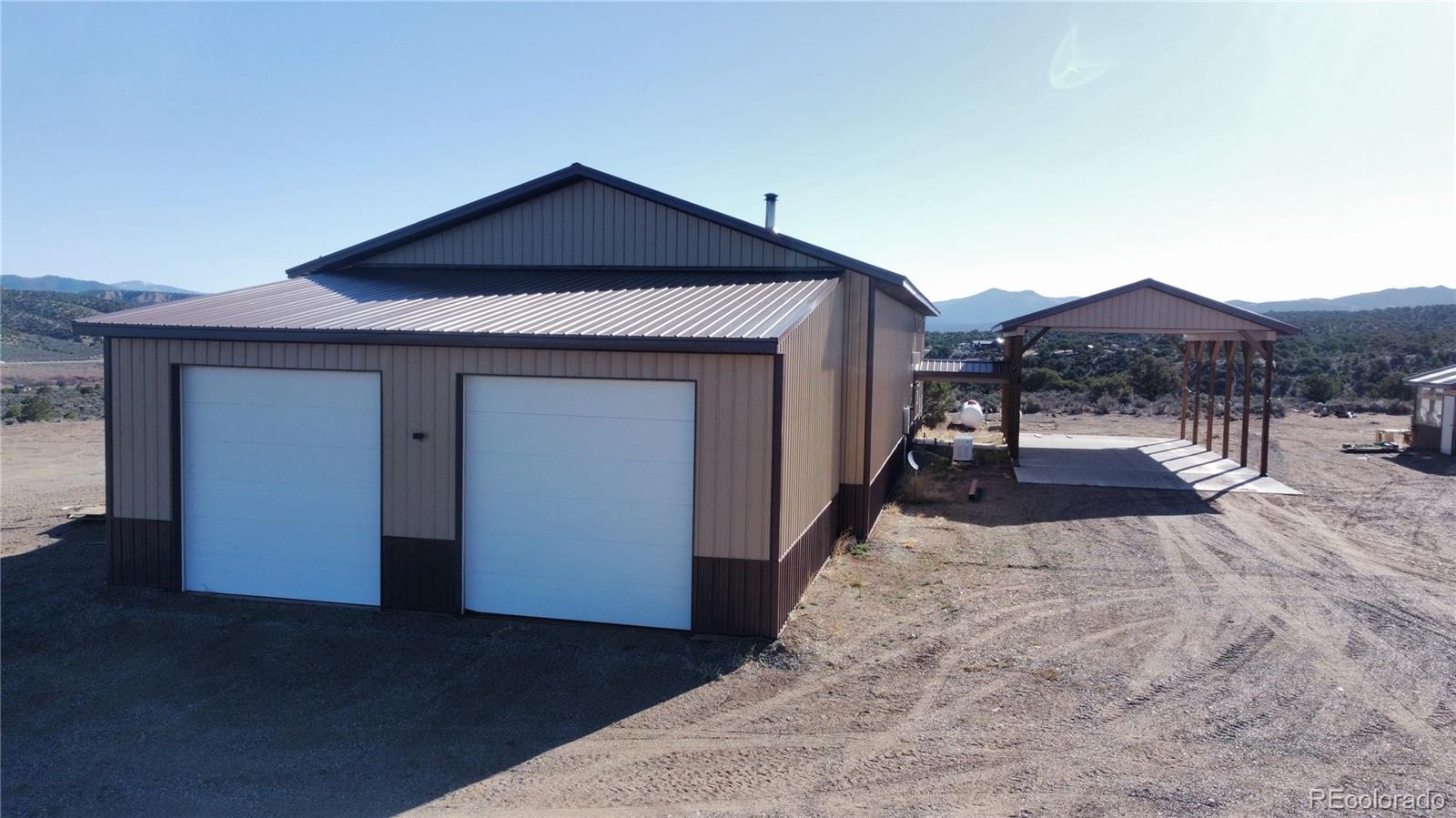 3744 Icehouse Road Fort Garland, CO 81133 - Photo 3 of 48 a view of a house with a yard