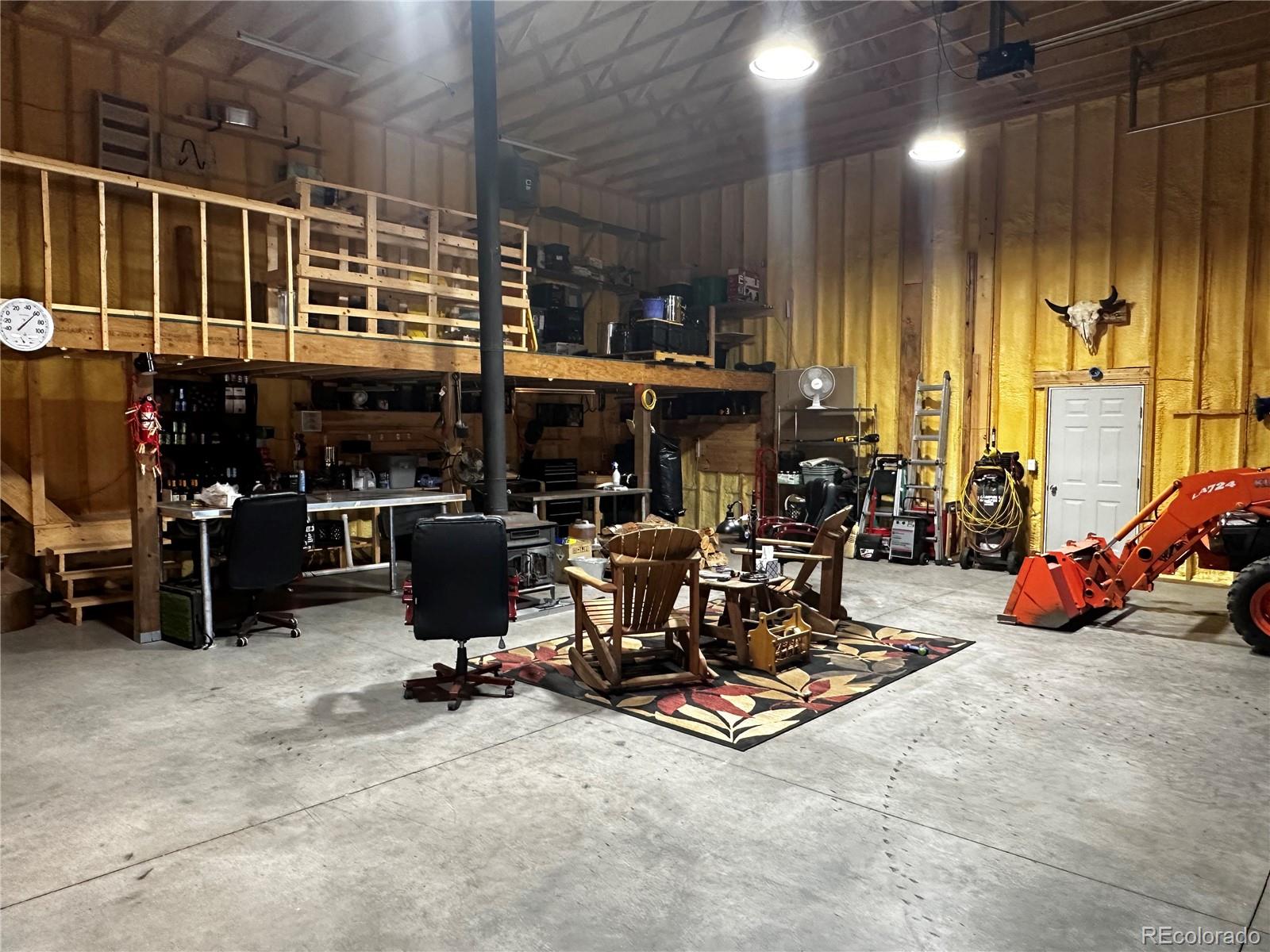 3744 Icehouse Road Fort Garland, CO 81133 - Photo 40 of 48 a view of a room with gym equipment