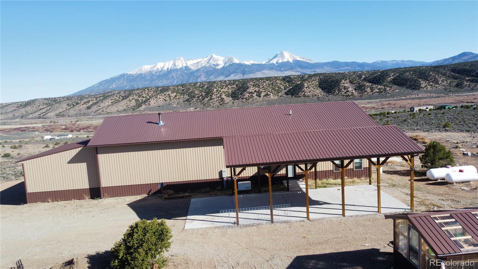 3744 Icehouse Road Fort Garland, CO 81133 - Photo 4 of 48 a patio with a table and chairs