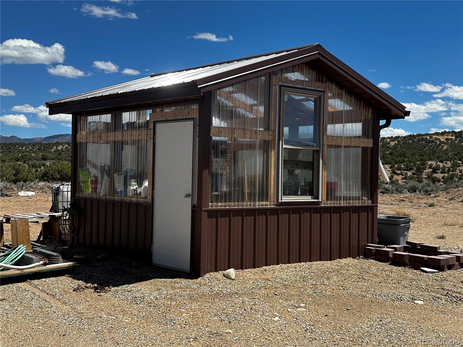 3744 Icehouse Road Fort Garland, CO 81133 - Photo 46 of 48 a front view of a house