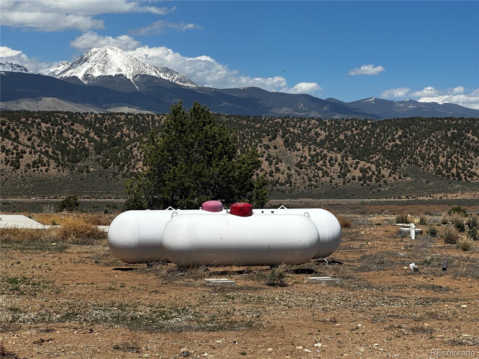 3744 Icehouse Road Fort Garland, CO 81133 - Photo 47 of 48 a view of a wooden floor and a yard