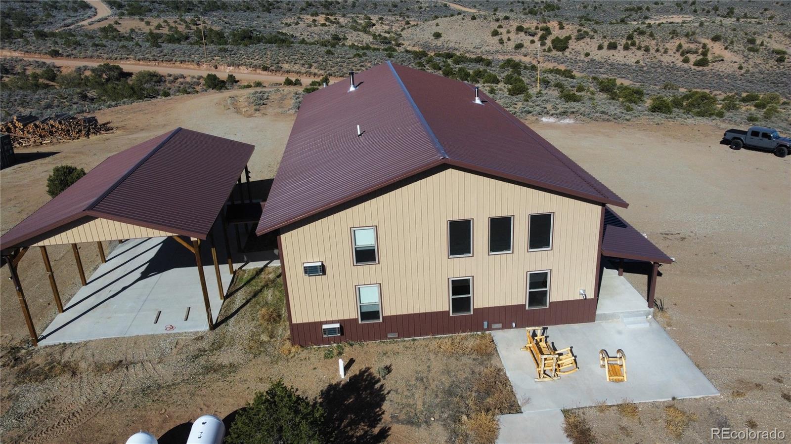 3744 Icehouse Road Fort Garland, CO 81133 - Photo 5 of 48 an aerial view of a house