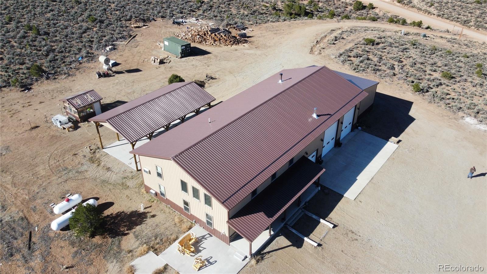 3744 Icehouse Road Fort Garland, CO 81133 - Photo 6 of 48 a view of a backyard with a deck