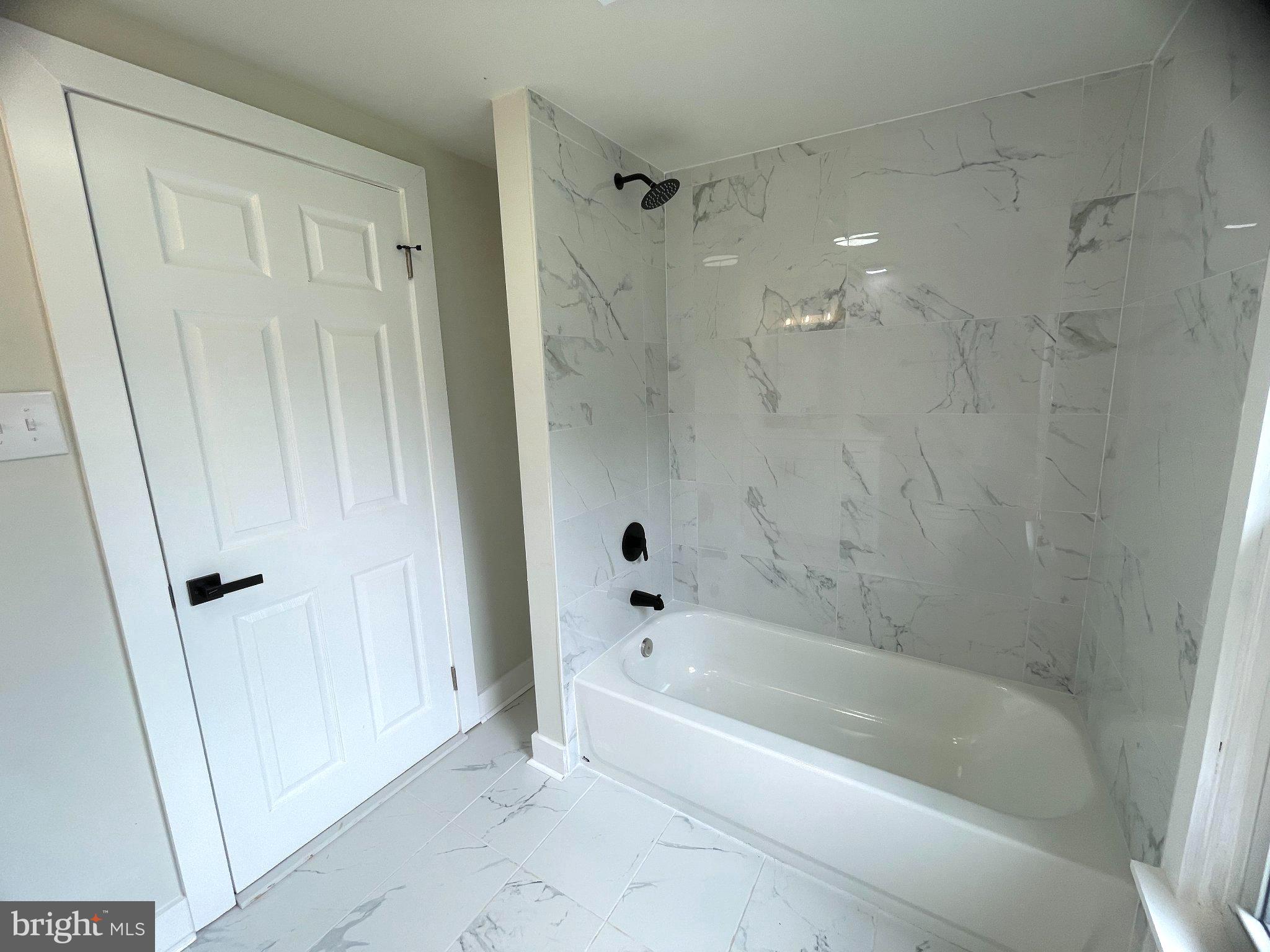 1006 Circle Drive Keymar, MD 21757 - Photo 10 of 45 Sleek marble bath retreat awaits you.