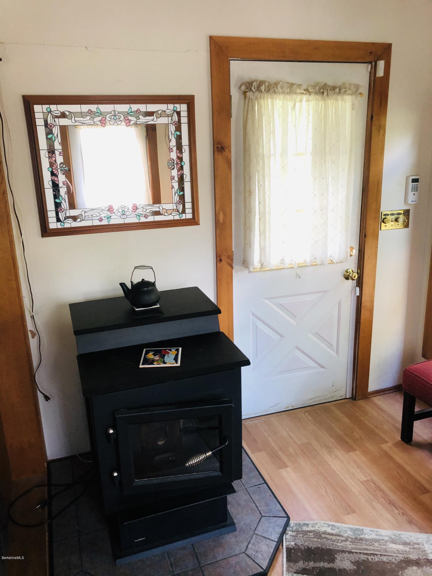 134 North Hoosac Road Williamstown, MA 01267 - Photo 14 of 26 Mudroom w/Pellet Stove