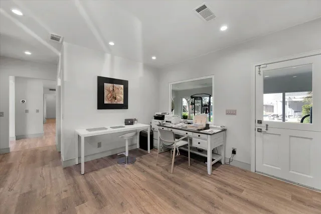 a bedroom with a bed and a shower