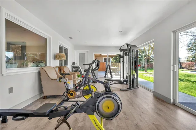 a view of wooden fence and trees