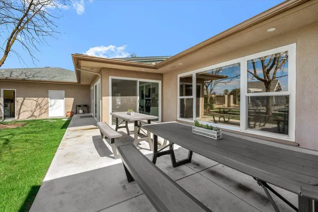 a view of backyard and entertaining space