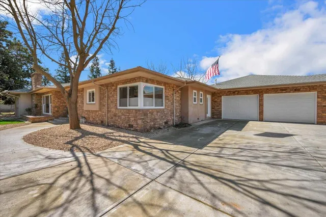 a view of a street with houses on both side