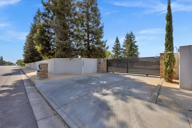 a view of a park with swings and slides