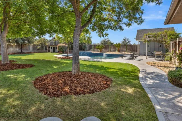 a view of a road with a building in the background