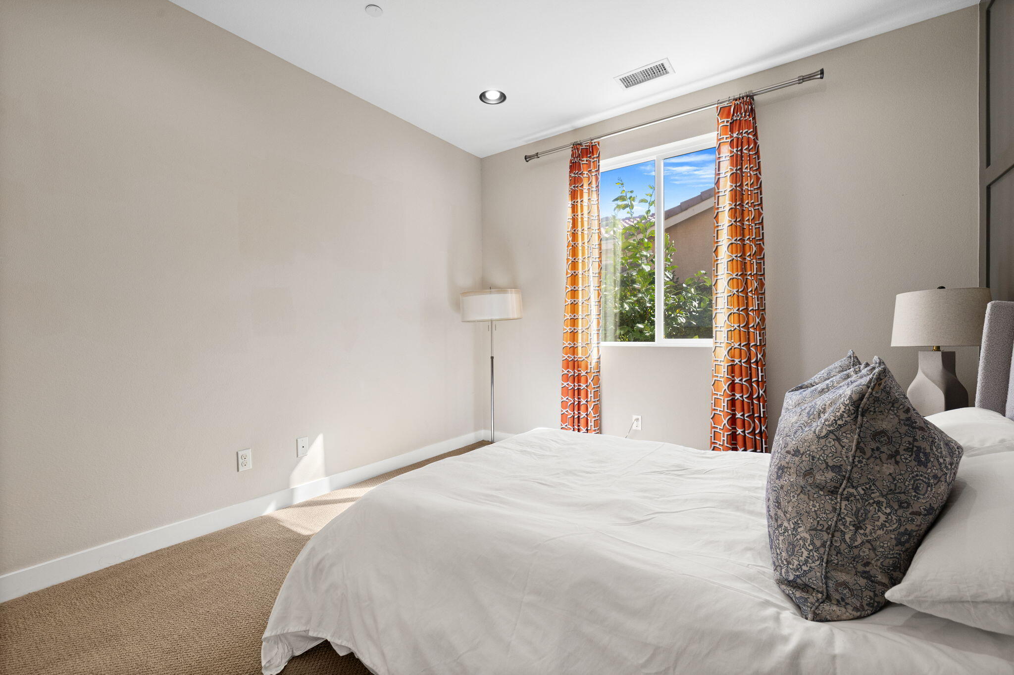 41371 Doyle Street Indio, CA 92203 - Photo 43 of 77 a bedroom with a bed and a window