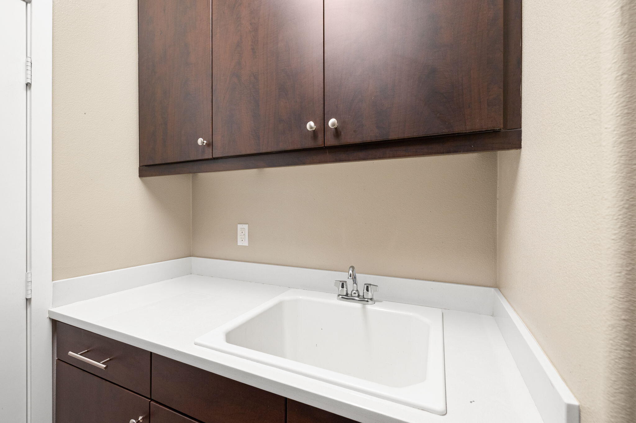 41371 Doyle Street Indio, CA 92203 - Photo 52 of 77 a bathroom with a sink and cabinets