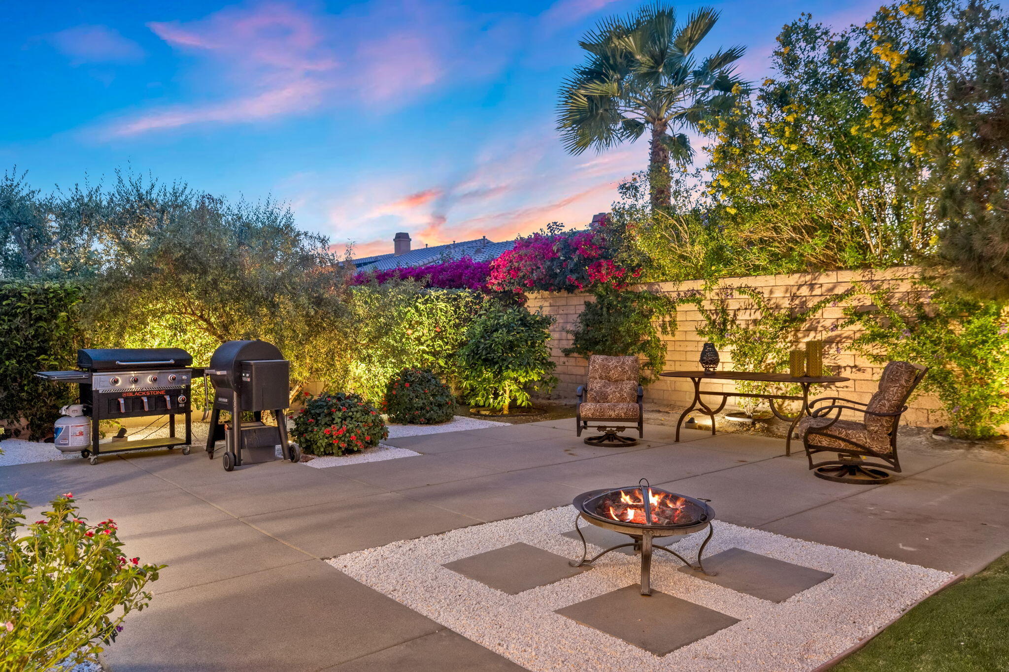 41371 Doyle Street Indio, CA 92203 - Photo 56 of 77 a outdoor space with lots of swings and slides