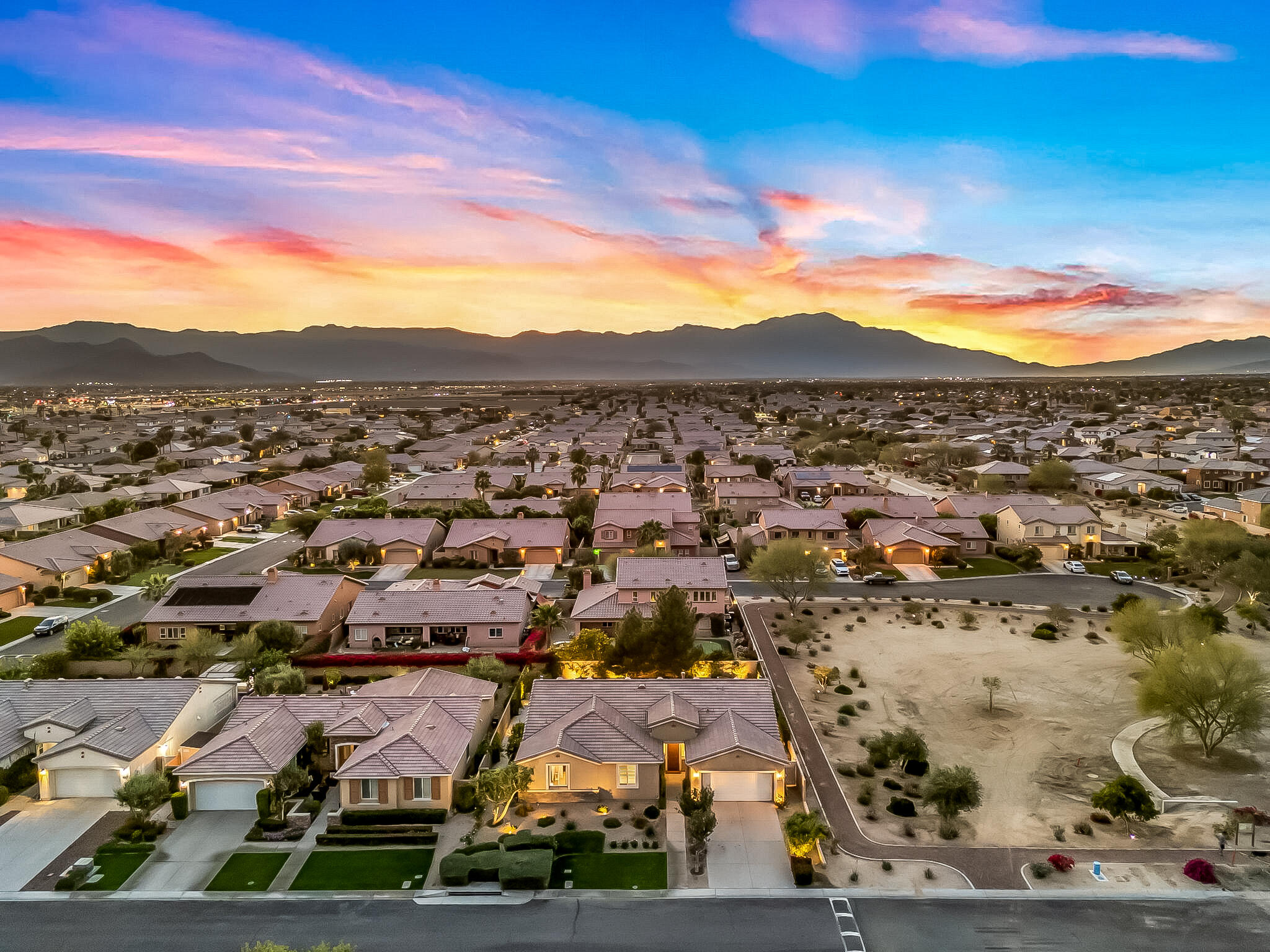 41371 Doyle Street Indio, CA 92203 - Photo 70 of 77 an aerial view of residential houses with outdoor space
