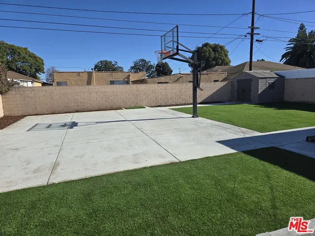 a view of a street in front of a house