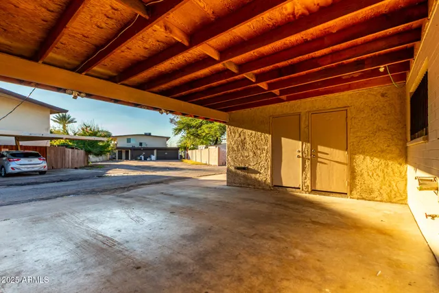 a view of a car park in front of a building