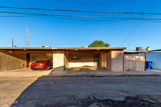 a view of a car park side of a road