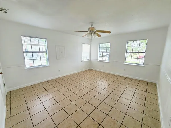 a view of an empty room and window