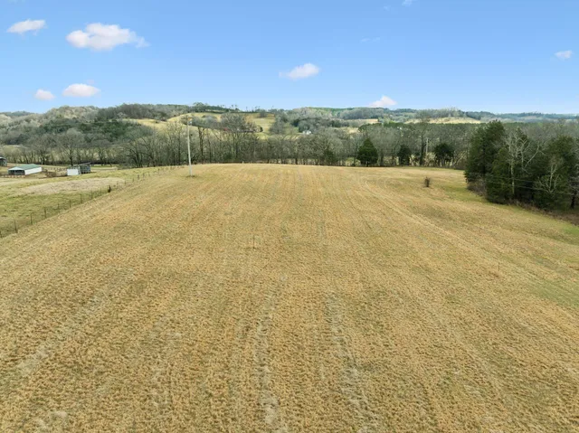a view of an outdoor space and a mountain