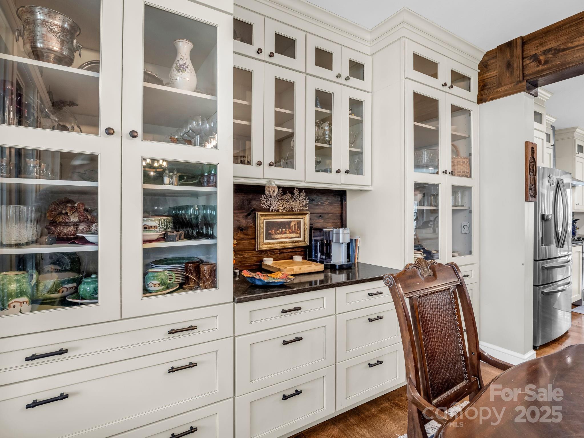 765 Higher Path Drive Saluda, NC 28773 - Photo 13 of 43 a view of walk in closet with clothes and shoes