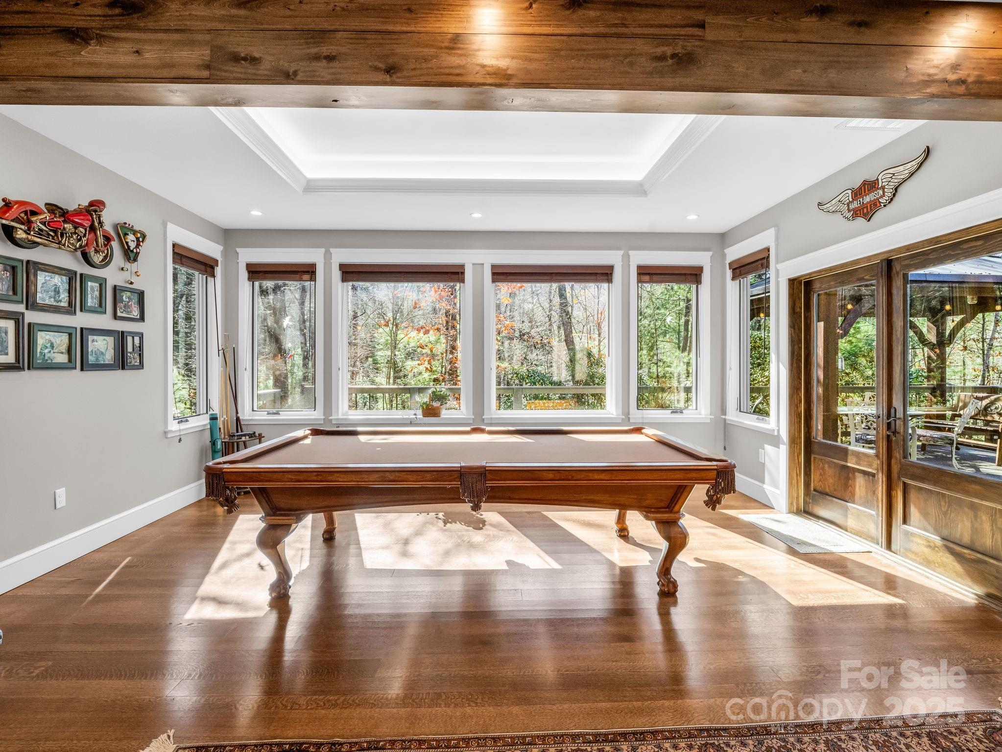 765 Higher Path Drive Saluda, NC 28773 - Photo 14 of 43 a living room with hardwood floor and large window