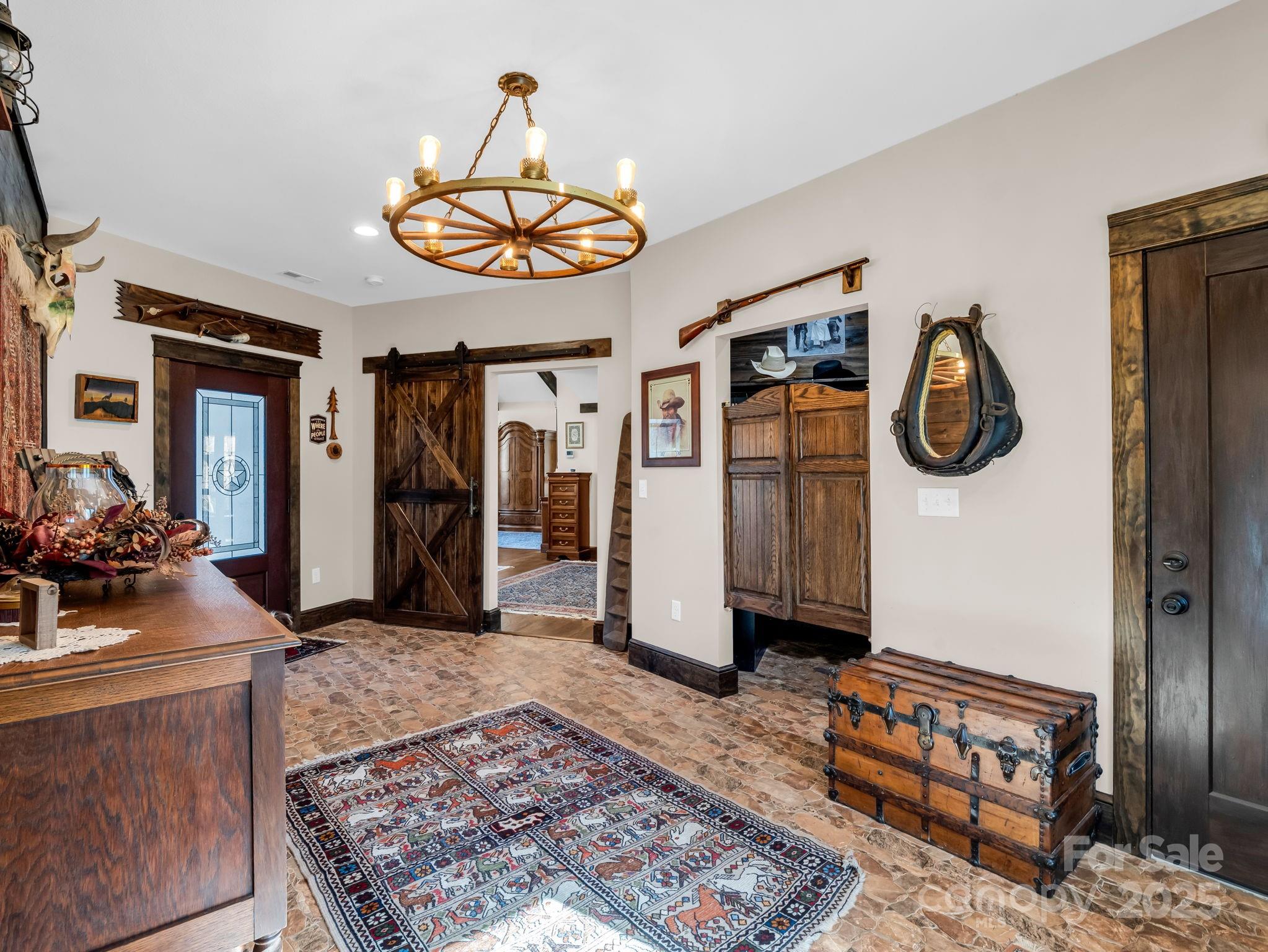 765 Higher Path Drive Saluda, NC 28773 - Photo 16 of 43 a view of a hallway with furniture and window