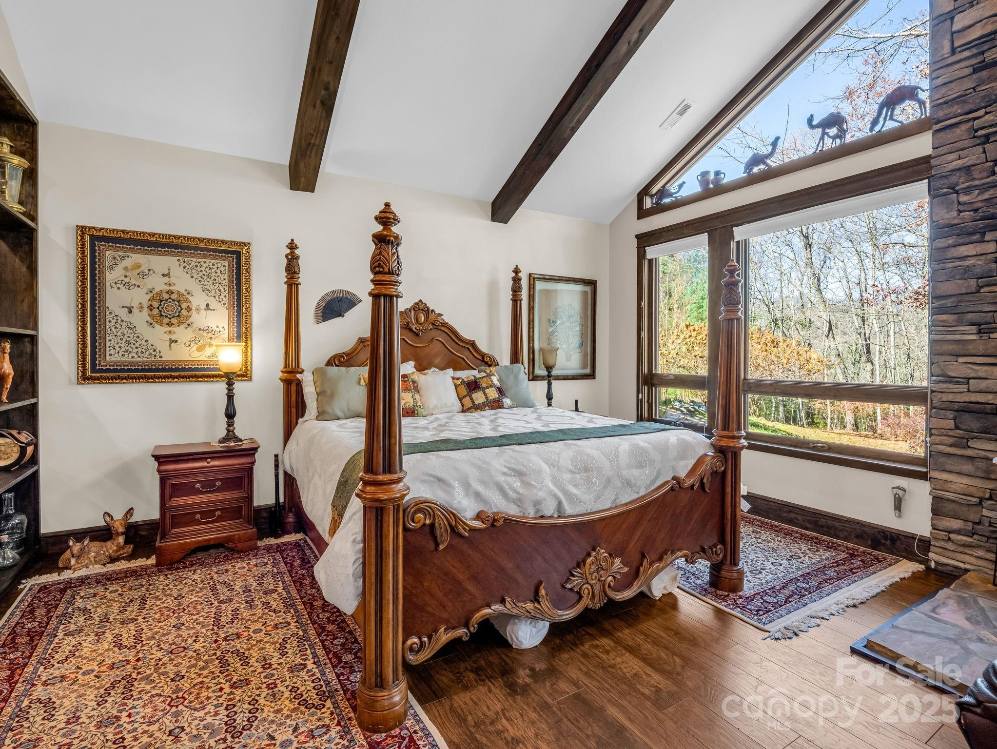 765 Higher Path Drive Saluda, NC 28773 - Photo 18 of 43 a bed room with a bed and a window