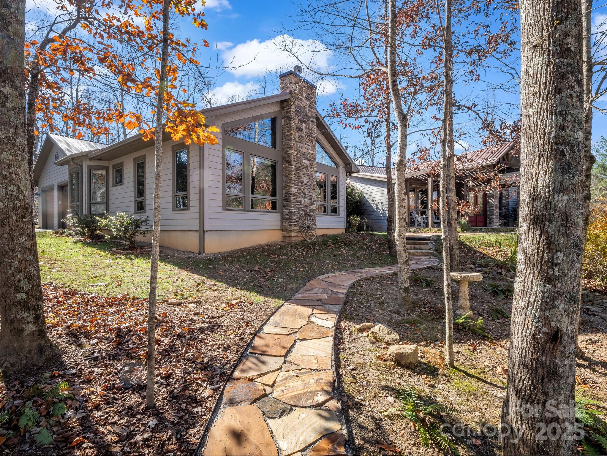 765 Higher Path Drive Saluda, NC 28773 - Photo 2 of 43 a view of a house with a yard