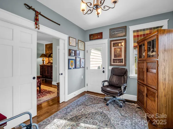 a bedroom with furniture and a window