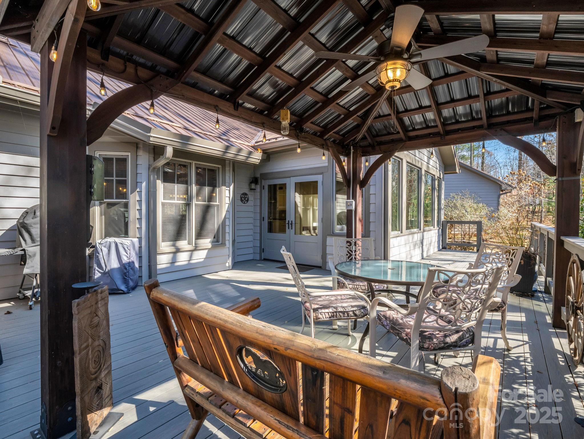 765 Higher Path Drive Saluda, NC 28773 - Photo 29 of 43 a view of a chair and table in the balcony