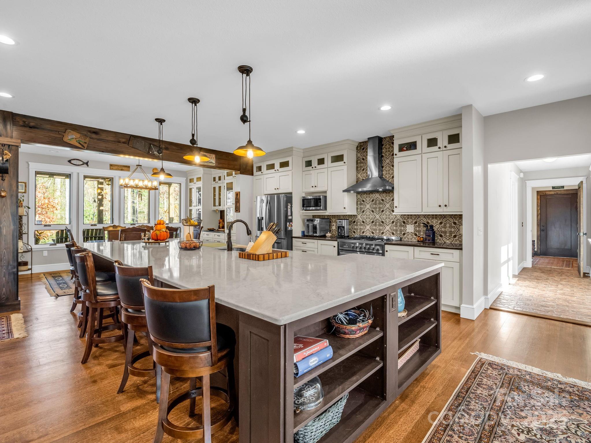 765 Higher Path Drive Saluda, NC 28773 - Photo 8 of 43 a large kitchen with a table and chairs