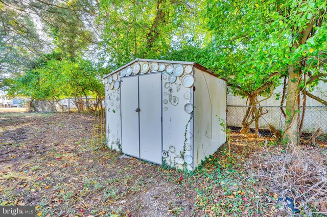 a house view with a backyard space