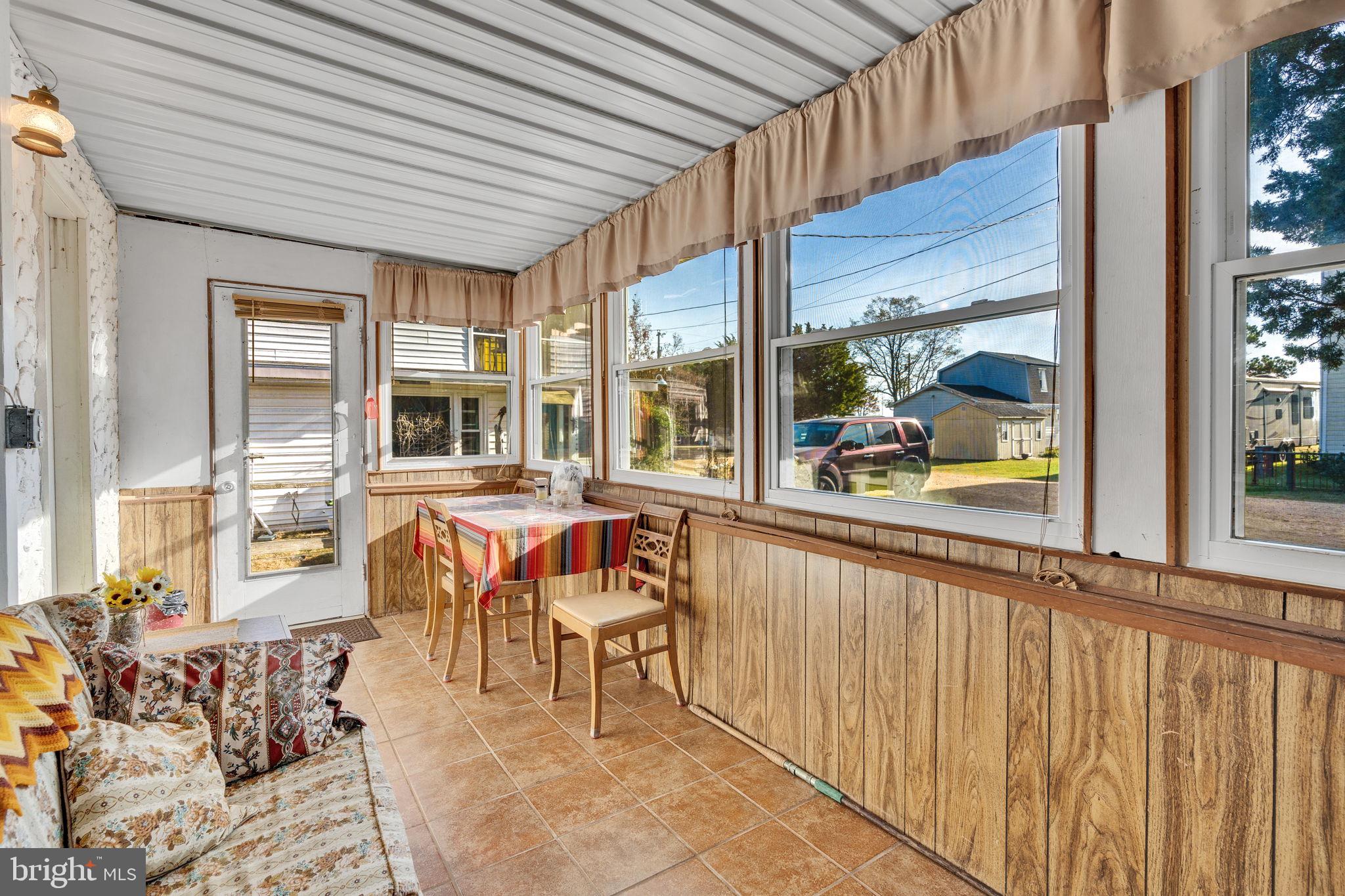 3096 Calvert Boulevard Lusby, MD 20657 - Photo 5 of 21 a outdoor space with chairs
