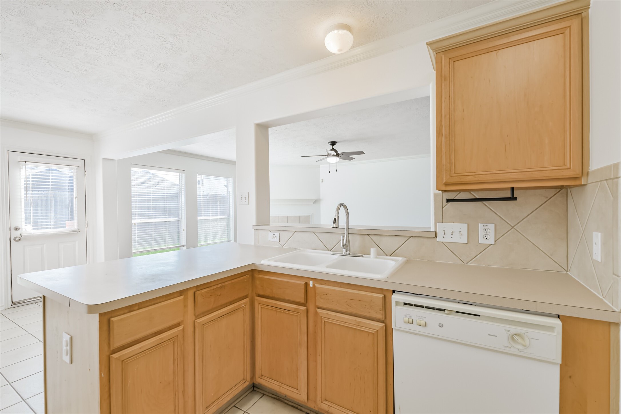 2507 Liza Court Spring, TX 77388 - Photo 15 of 37 a kitchen with a sink and a window