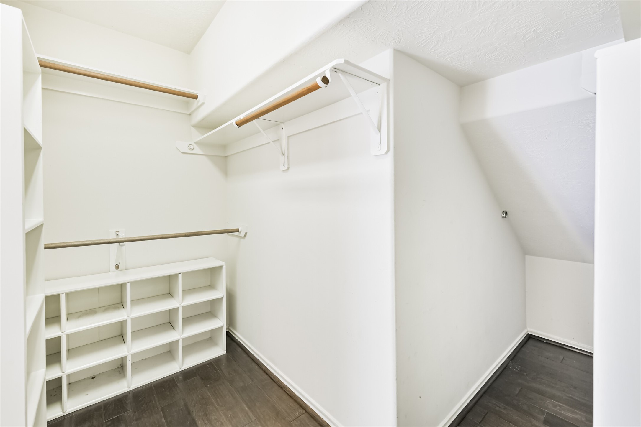 2507 Liza Court Spring, TX 77388 - Photo 22 of 37 a view of walk in closet with empty racks