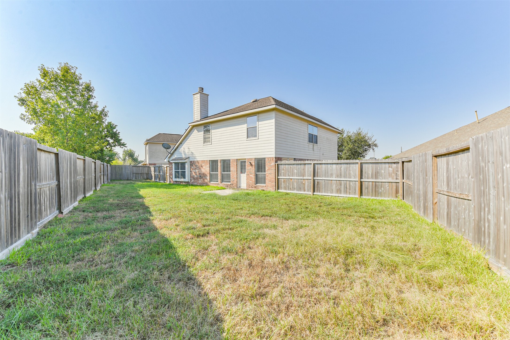2507 Liza Court Spring, TX 77388 - Photo 33 of 37 a view of a yard in front of a house with a large tree