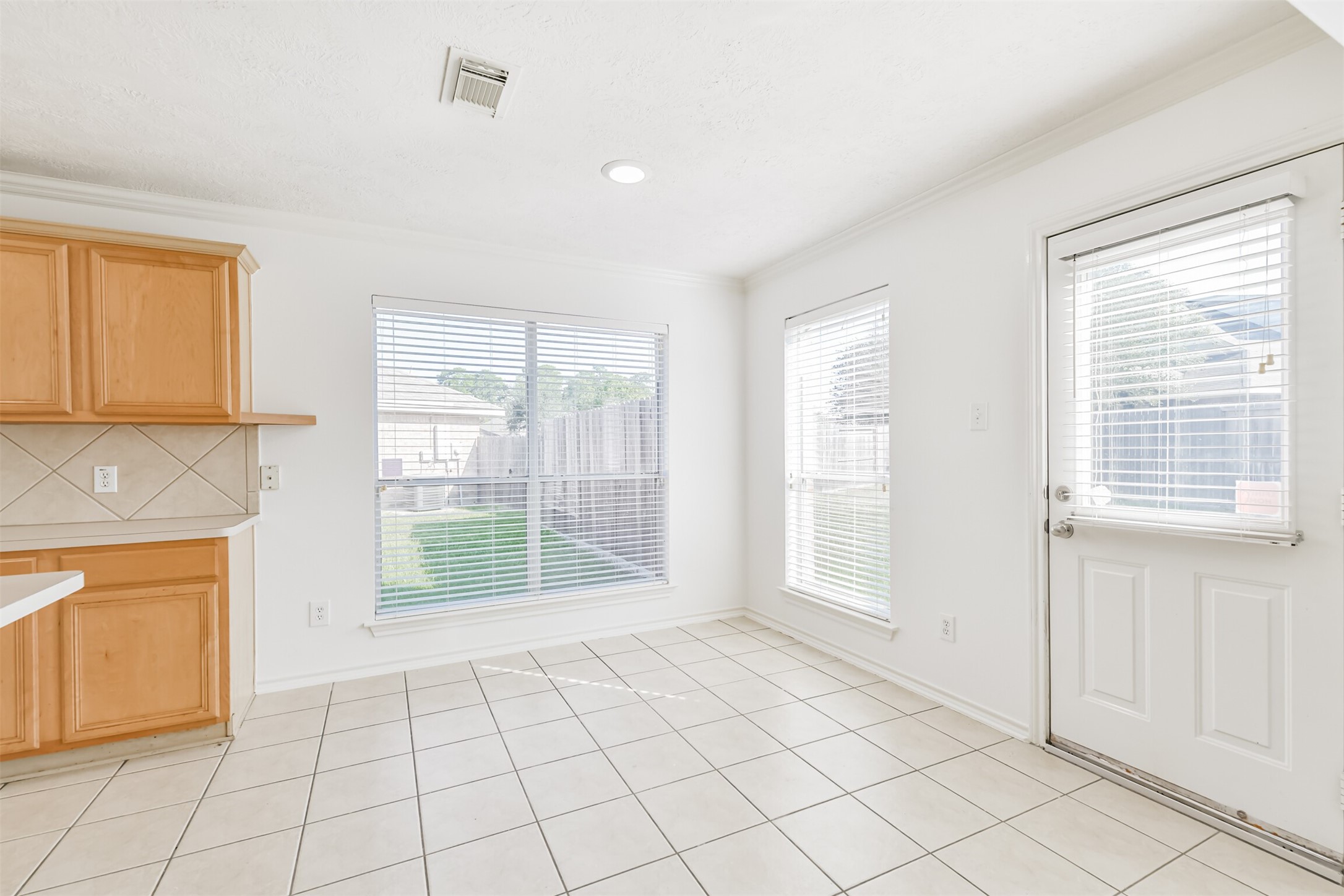 2507 Liza Court Spring, TX 77388 - Photo 9 of 37 a view of an empty room with glass door
