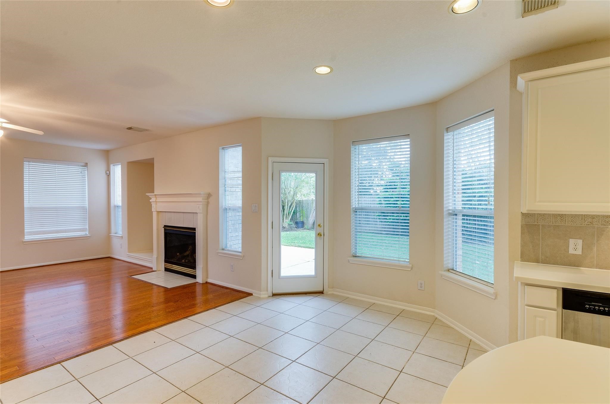 4019 Angel Spring Drive Sugar Land, TX 77479 - Photo 15 of 50 a view of an empty room with glass door and wooden floor