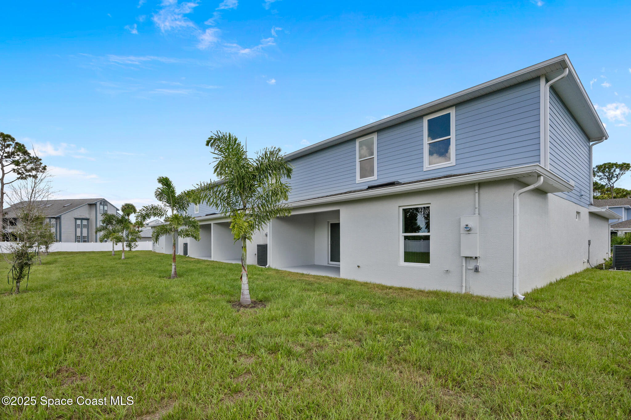 168 Hidden Wds Place Melbourne, FL 32901 - Photo 29 of 31 a house view with a garden space