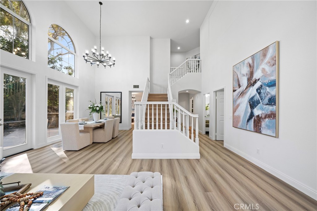 18 Broadleaf Irvine, CA 92612 - Photo 20 of 52 a view of a livingroom with furniture window and wooden floor