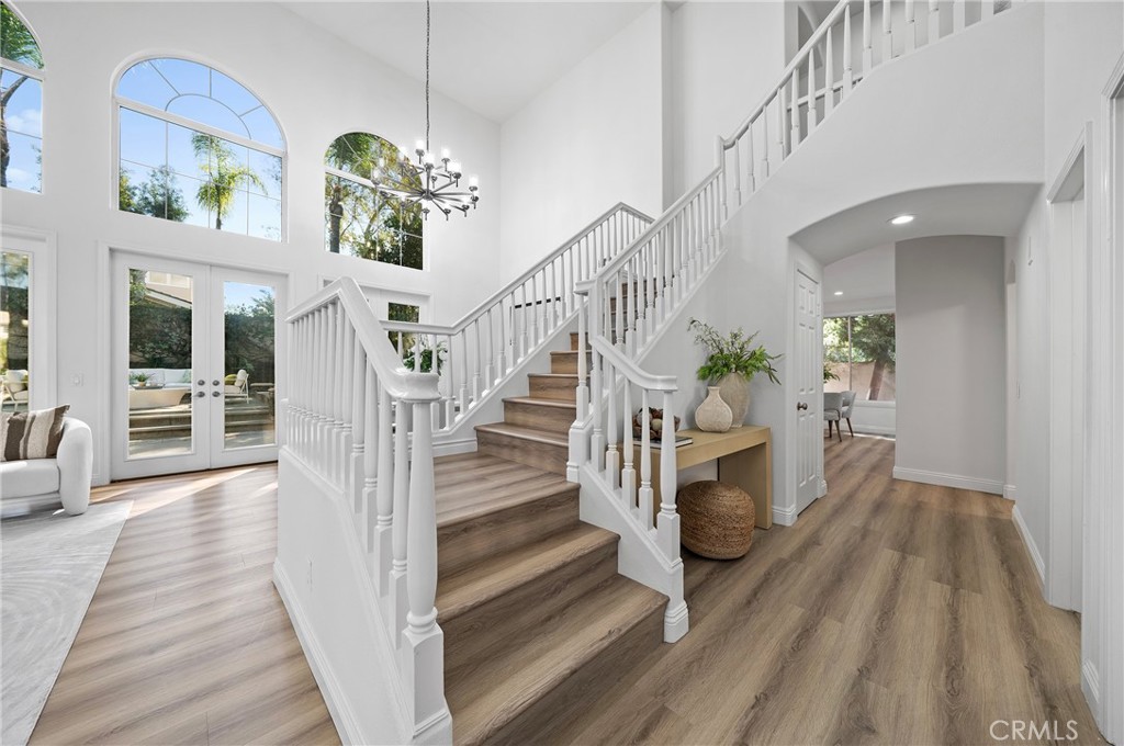 18 Broadleaf Irvine, CA 92612 - Photo 21 of 52 a view of entryway and hall with wooden floor