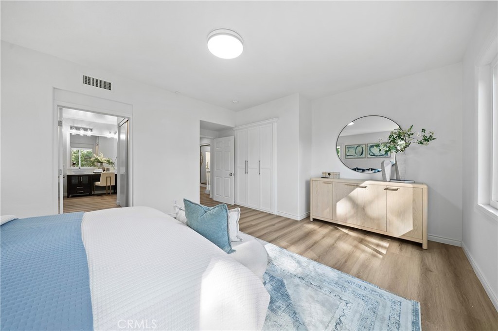 18 Broadleaf Irvine, CA 92612 - Photo 24 of 52 a bedroom with a bed and a couch