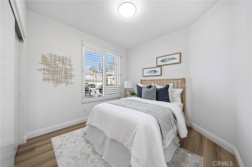 18 Broadleaf Irvine, CA 92612 - Photo 27 of 52 a bed room with a bed and a window