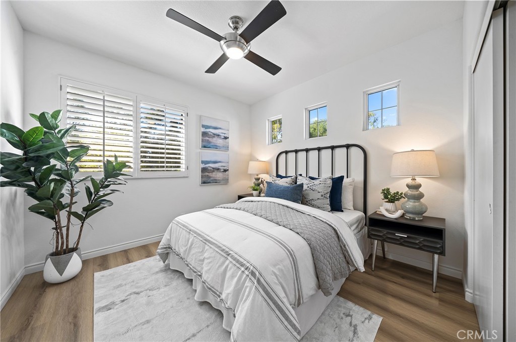 18 Broadleaf Irvine, CA 92612 - Photo 30 of 52 a bedroom with a bed and window