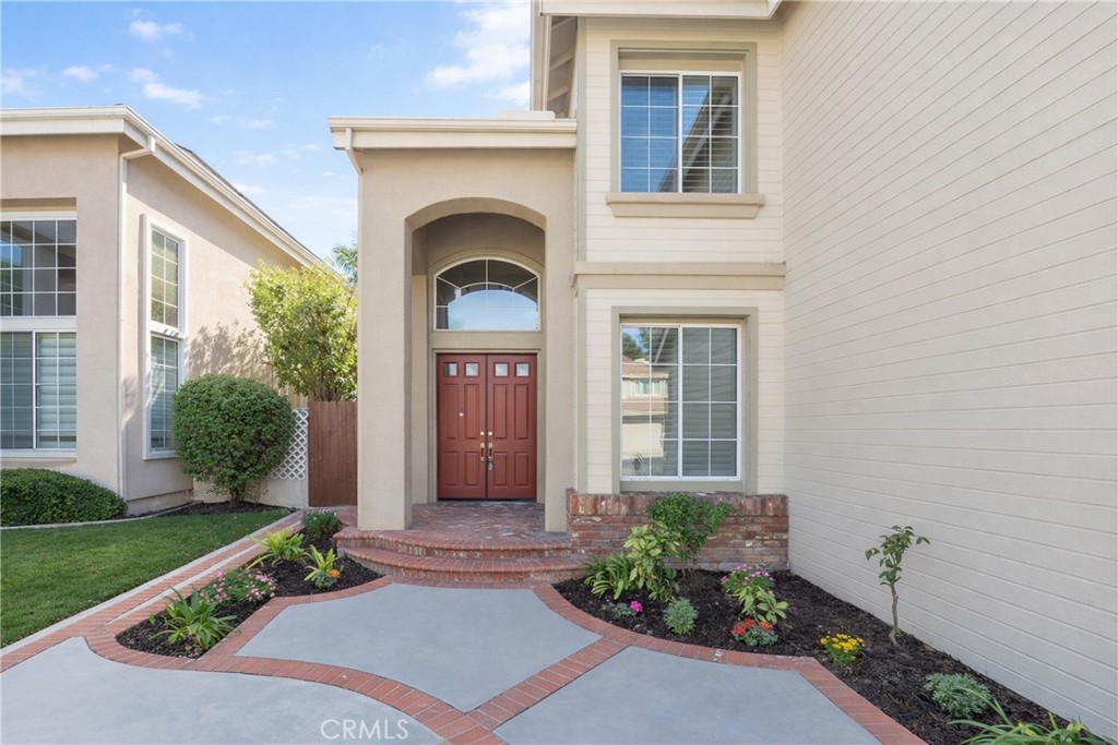 18 Broadleaf Irvine, CA 92612 - Photo 35 of 52 a front view of a house with a yard outdoor seating and garage