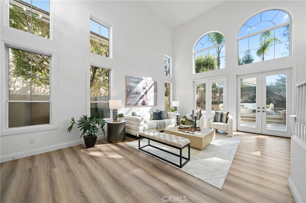 18 Broadleaf Irvine, CA 92612 - Photo 4 of 52 a living room with furniture and a large window