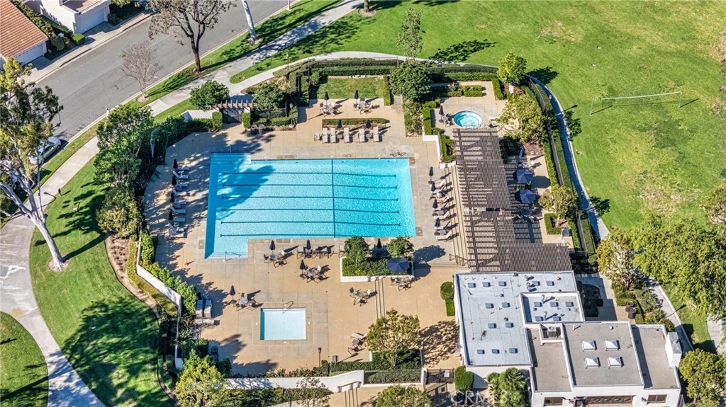 18 Broadleaf Irvine, CA 92612 - Photo 46 of 52 an aerial view of a residential apartment building with a yard