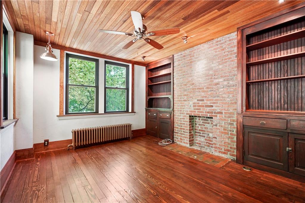 114 East Waldheim Road Pittsburgh, PA 15215 - Photo 12 of 25 This room is off the kitchen and has endless possibilities. Notice the original built-ins and wood ceiling.