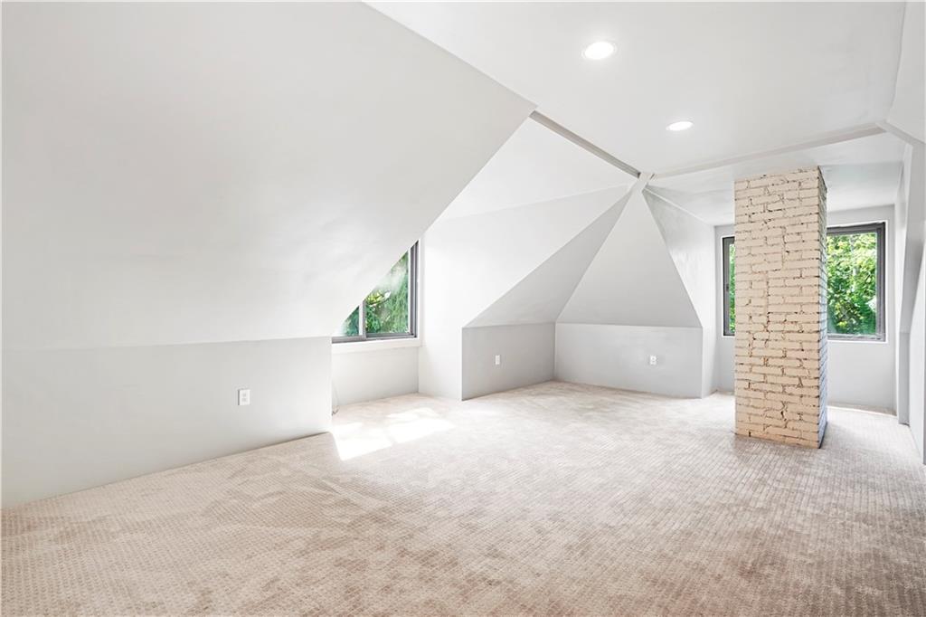 114 East Waldheim Road Pittsburgh, PA 15215 - Photo 19 of 25 3rd flr is finished space and offers an additional bedroom as well as this open space.